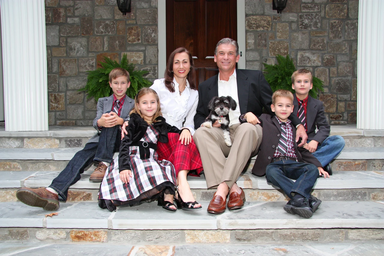 Deane and Erika Johnson with their children and Moses